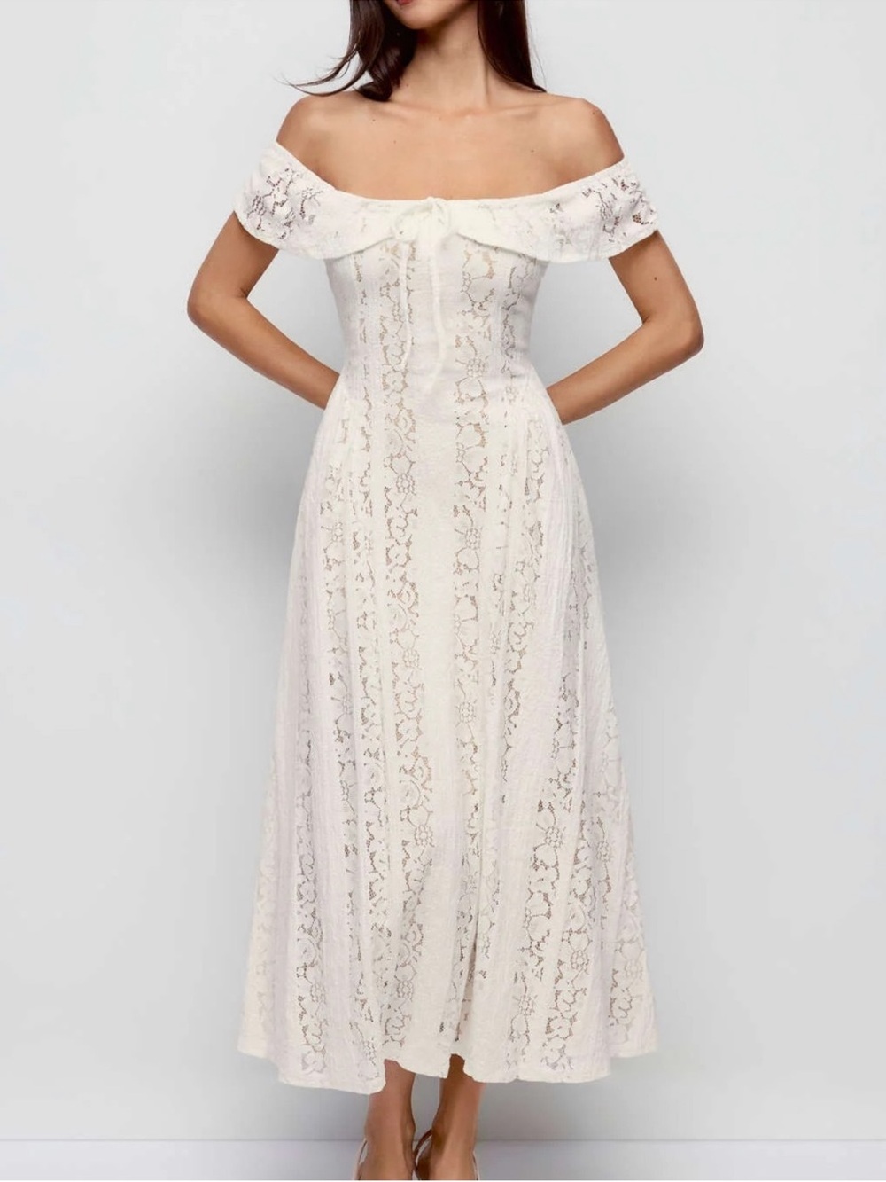 LACE SCULPTURAL OFF-SHOULDER KNOTTED FLARED MAXI DRESS
